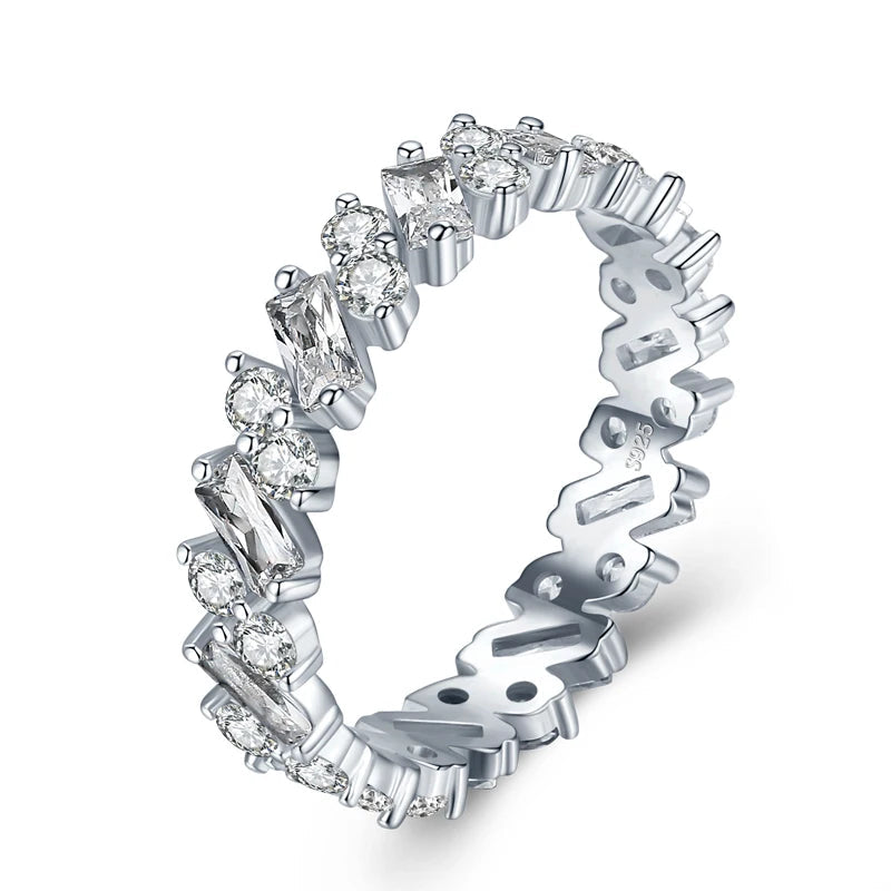 A silver eternity ring with a seamless row of cubic zirconia stones.