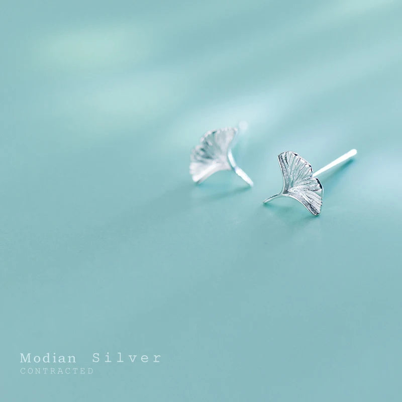 Silver earrings with delicate flower earrings in silver color
