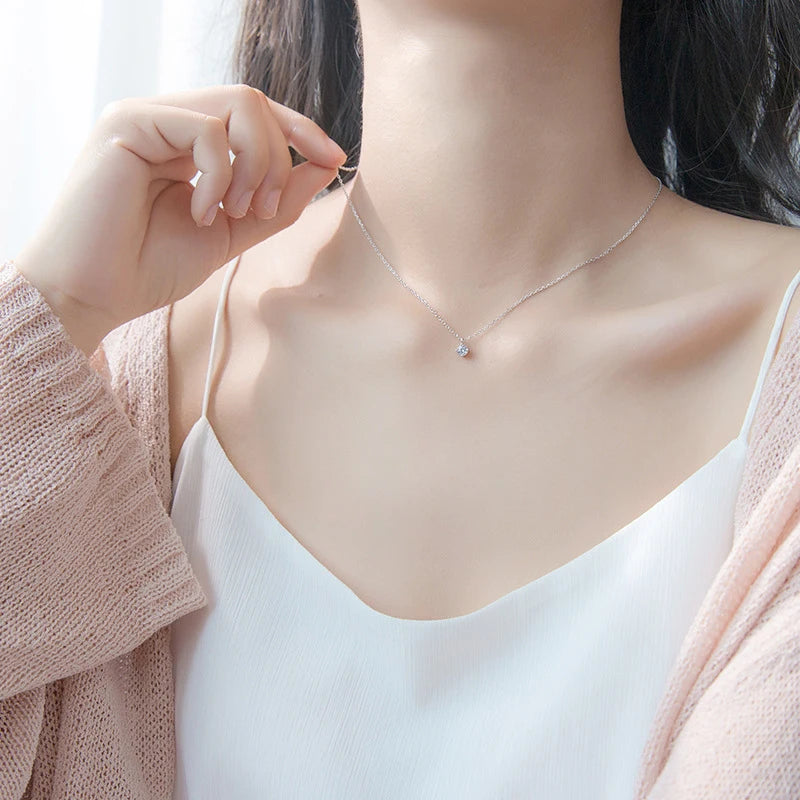 Polished sterling silver chain necklace with round CZ charm