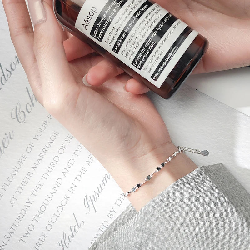 Close view of 925 silver showing a sterling silver bracelet shine