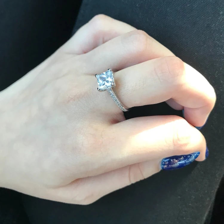 Engagement ring and wedding ring look with bright cubic zirconia center