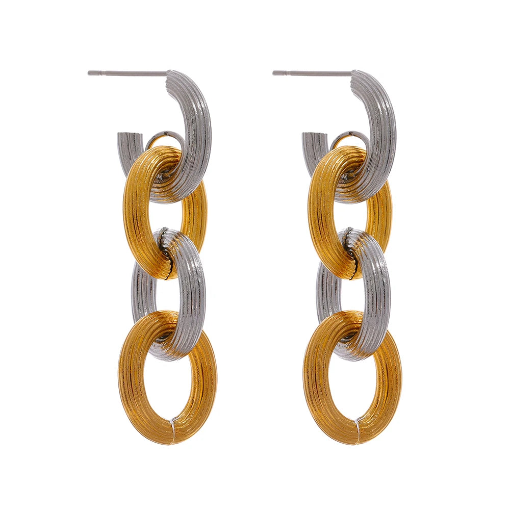Stainless steel earrings displayed with chain chain gold texture