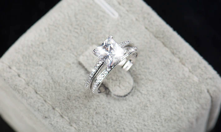 Silver wedding ring paired with engagement ring in 925 silver