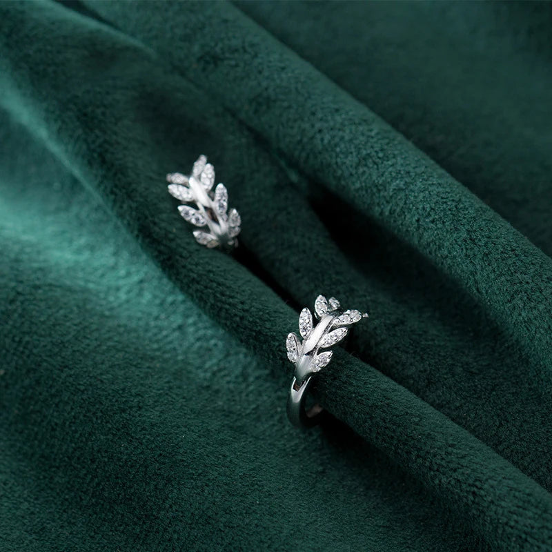 Close up of 925 sterling silver silver hoop with Tree Branch design