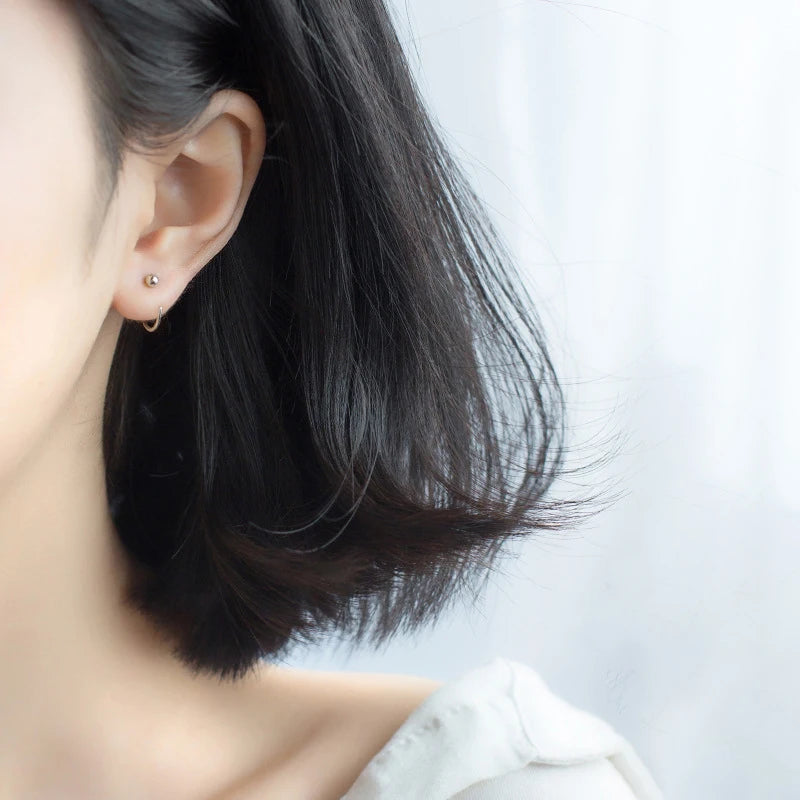 Pair of sterling silver hoop earrings crafted in 925 sterling silver