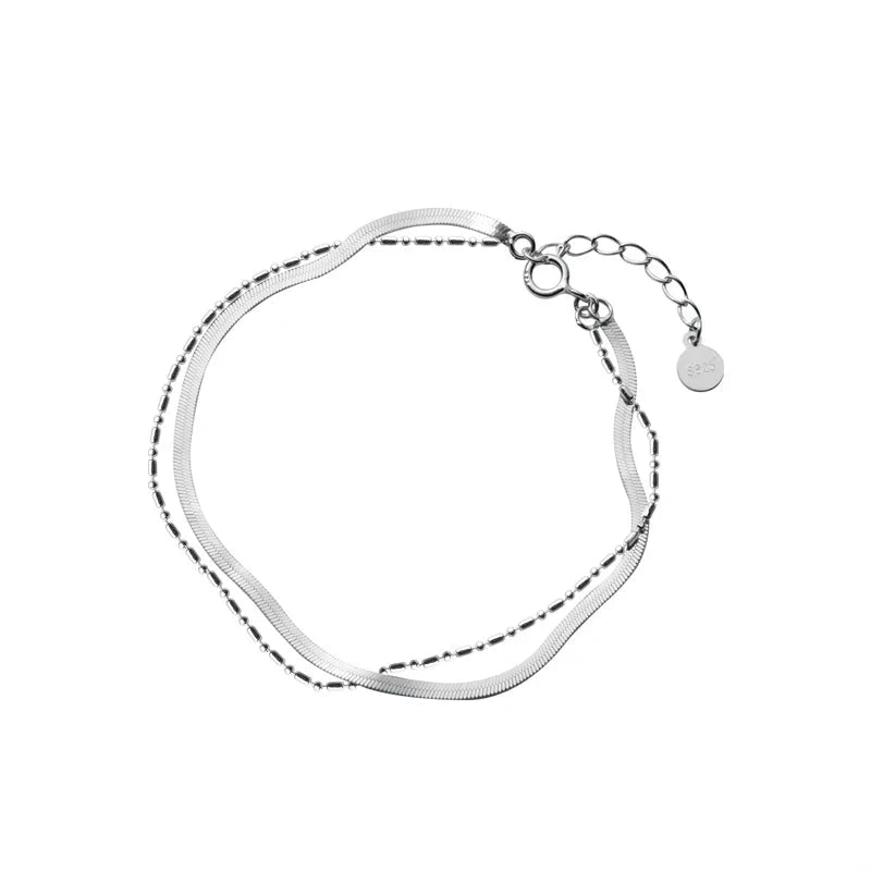 Chain bracelet styled as a sterling silver bracelet with subtle shine