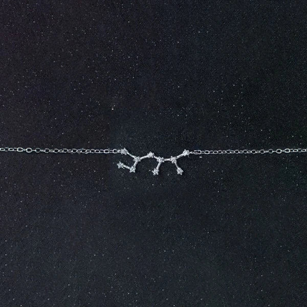 Timeless bracelet charm bracelet layered with a silver bangle