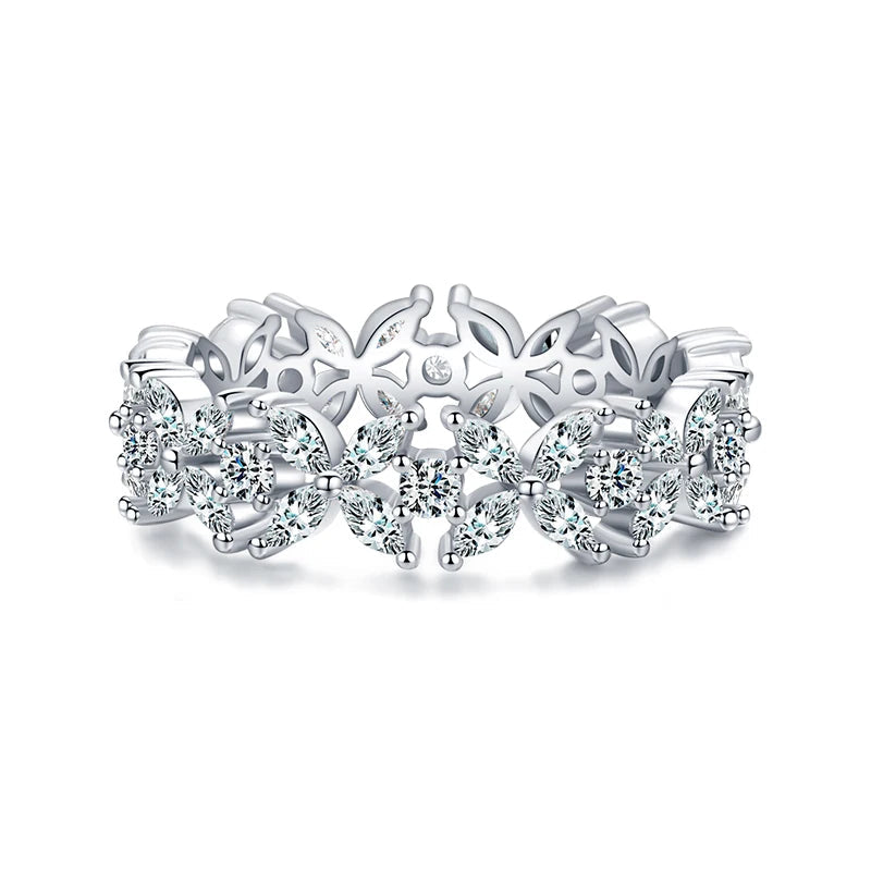 CZ flower ring in sterling silver shown as a delicate stackable ring