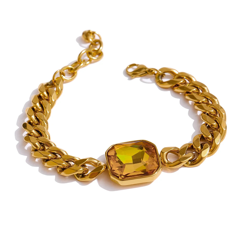 Gift box display of a gold bracelet with gold chain detail