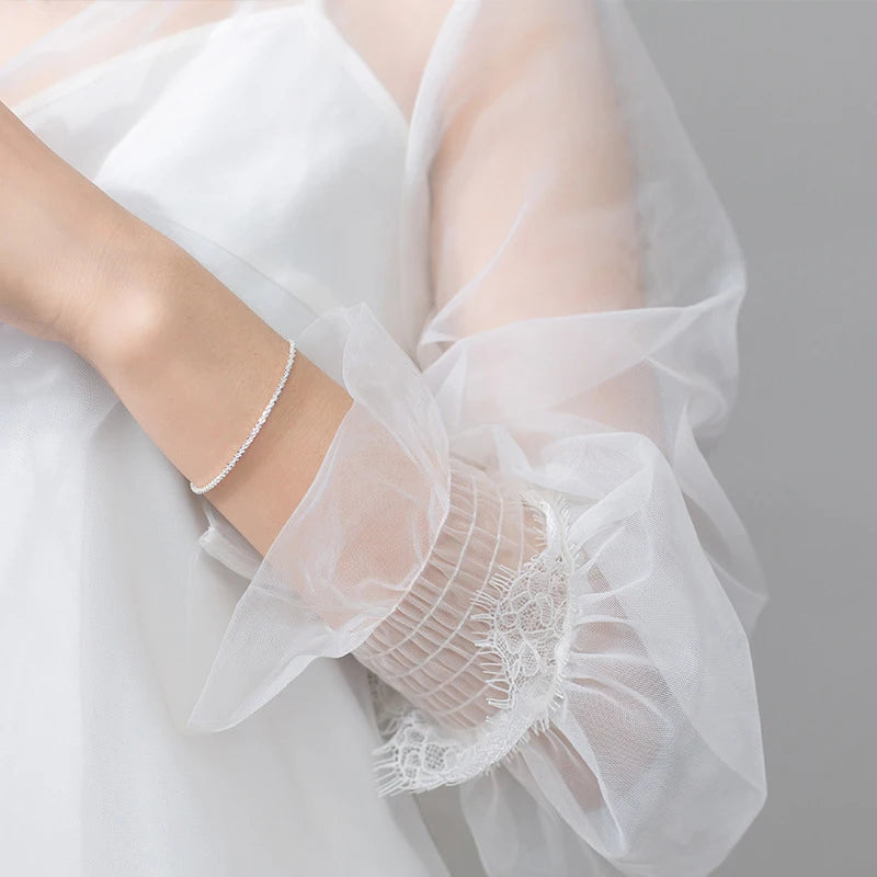 Pandora bracelet charms on a classic sterling silver bracelet