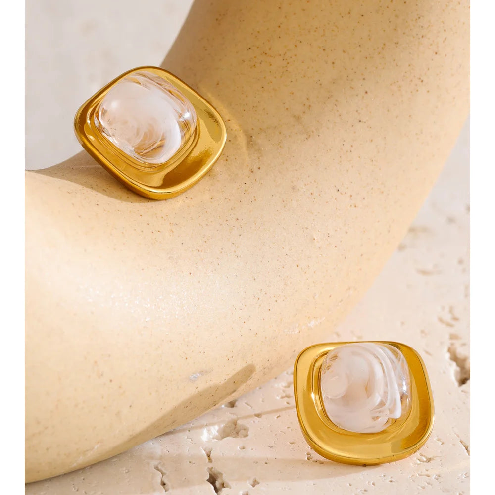 Stylish stud earrings gold tone with white and green resin