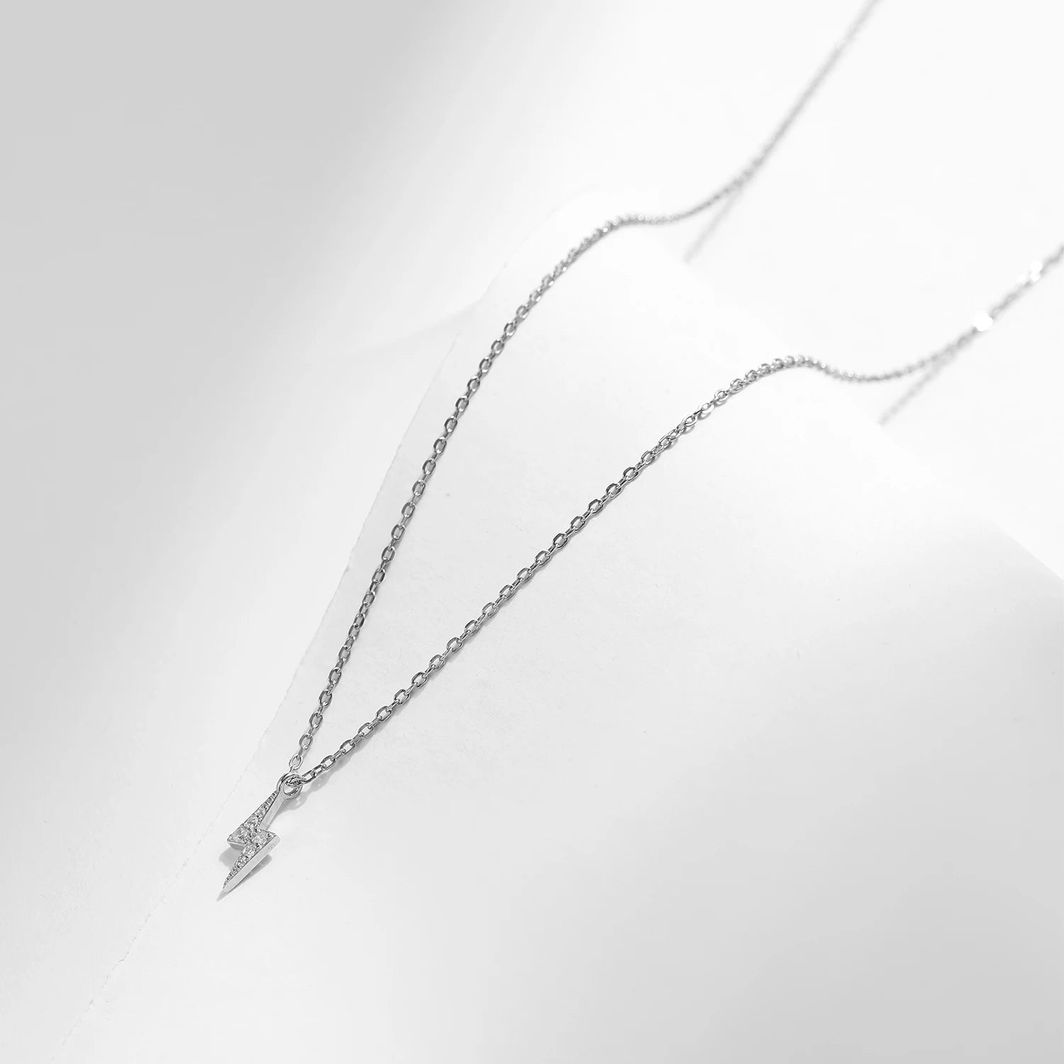 Sterling silver necklace featuring a refined pendant necklace center