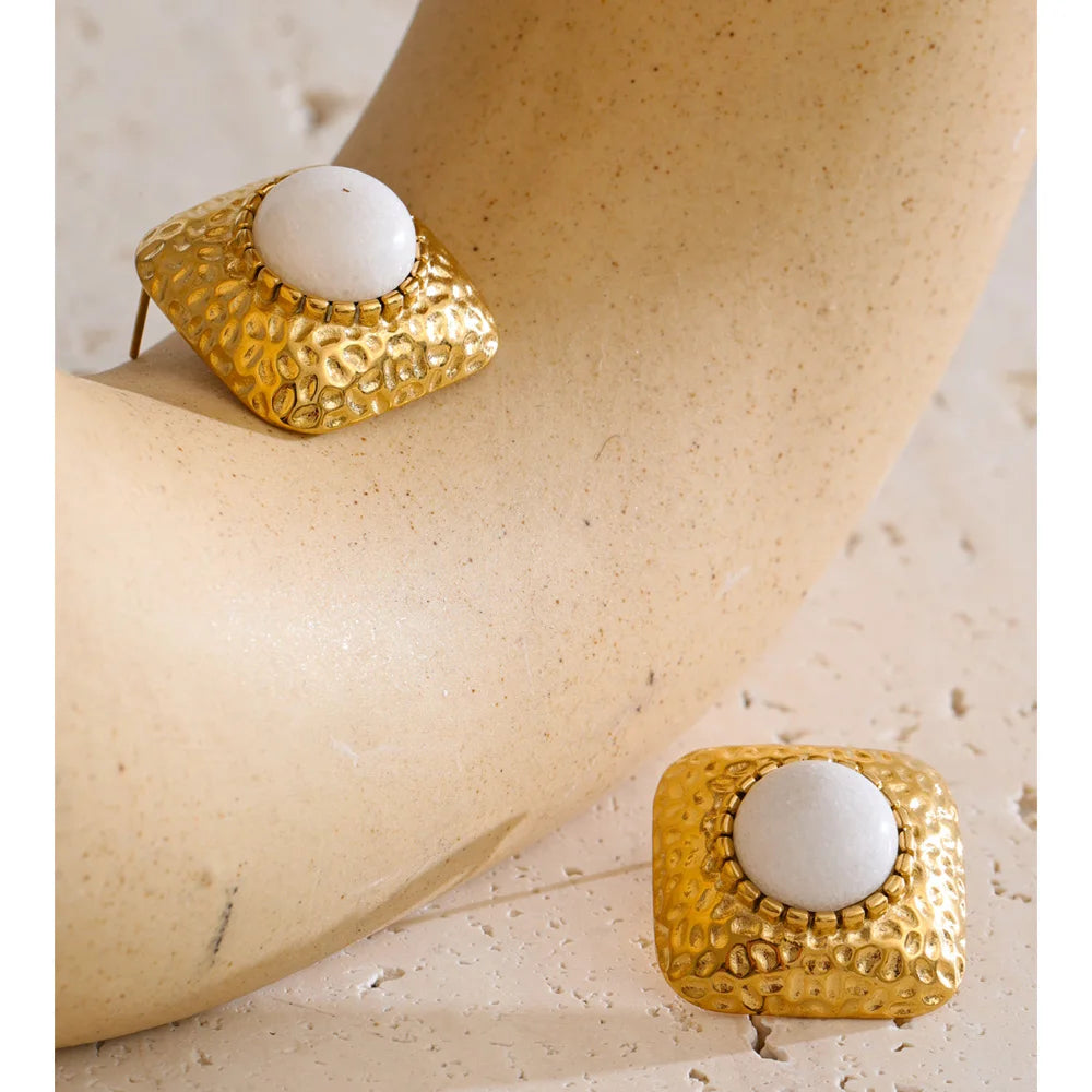 Bold ear rings with hammer metal texture and golden finish