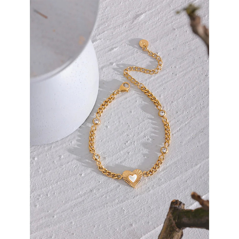 Chain bracelet with cubic zirconia accent and subtle bracelet charm