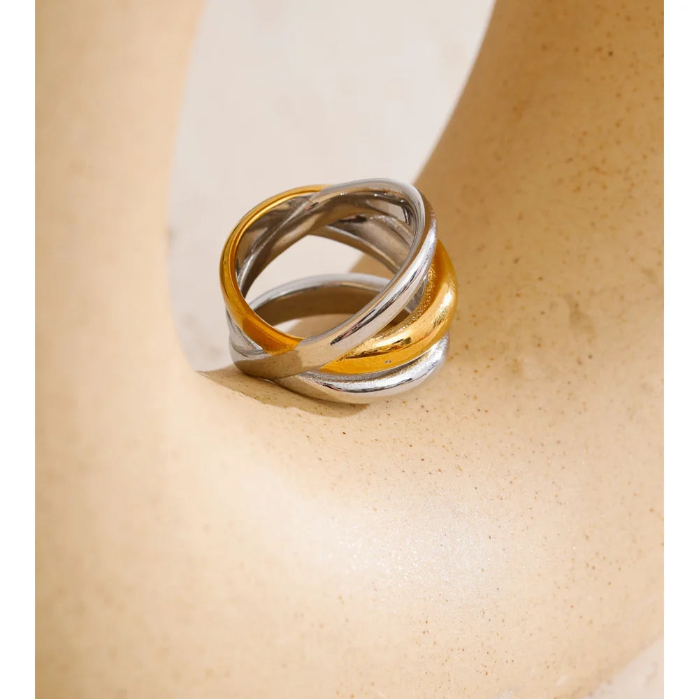 Bold geometric ring with stacked layered gold design