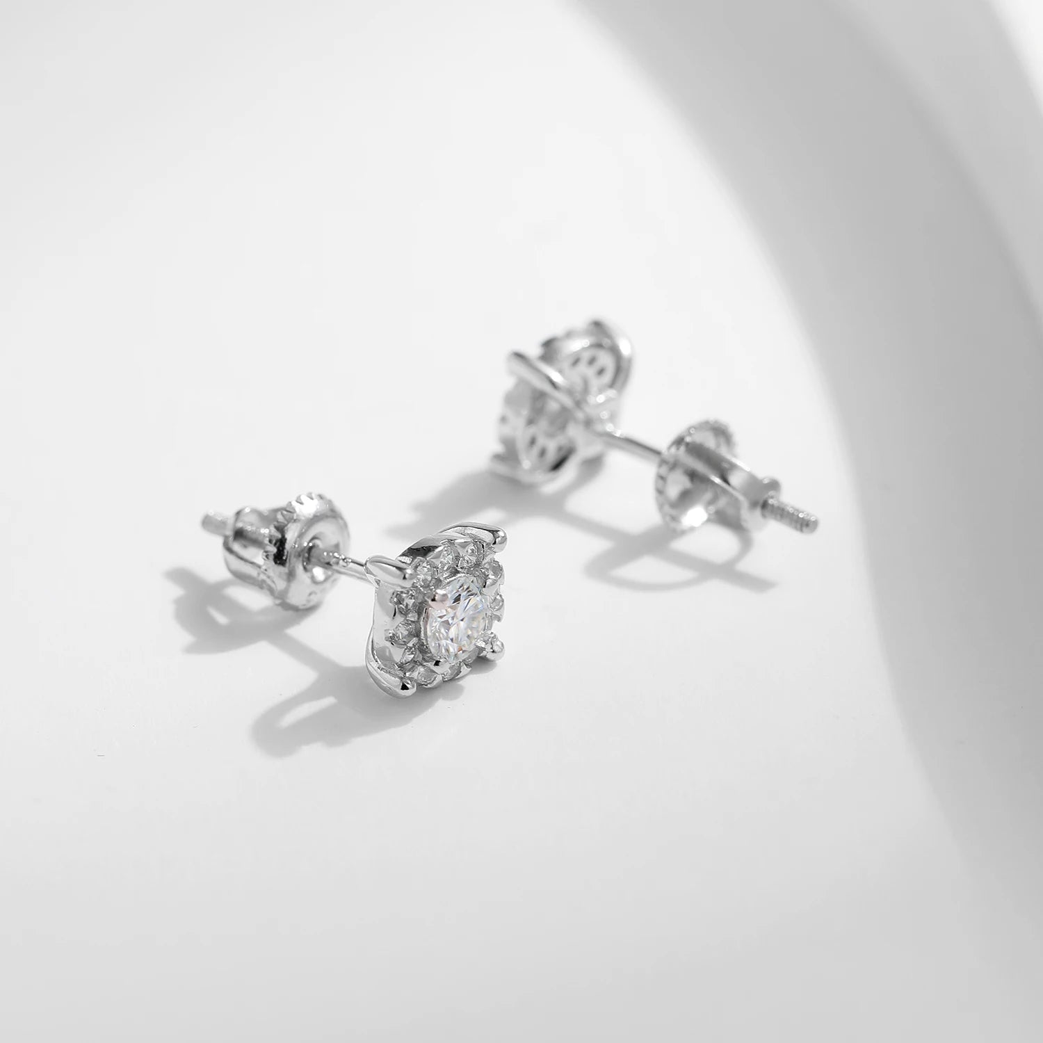 Elegant ear rings look with round cut moissanite diamond centers