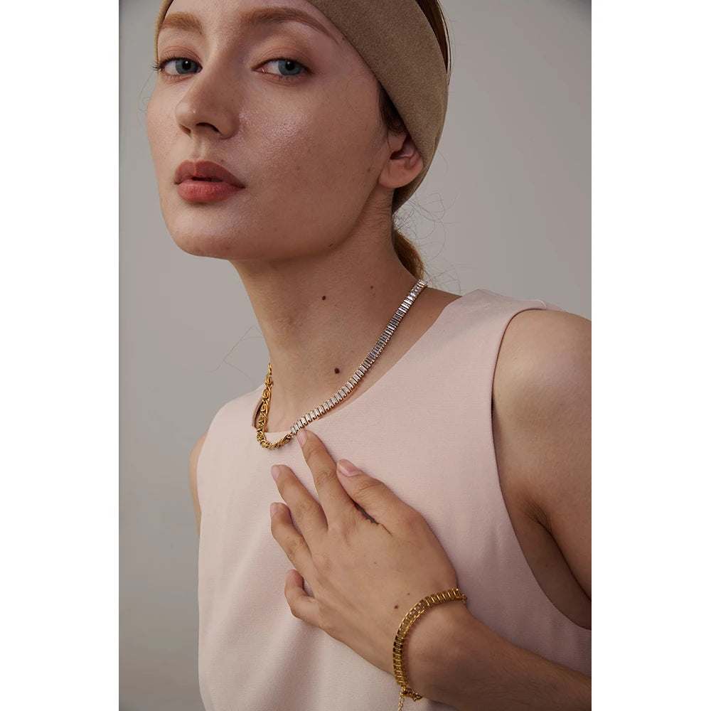 Cubic zirconia sparkle on a refined chain and bracelet ensemble