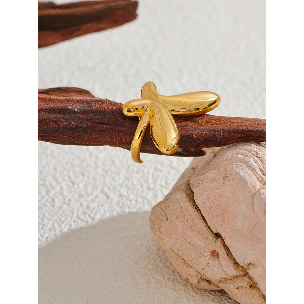 Elegant butterfly open ring styled with gold jewelry accents