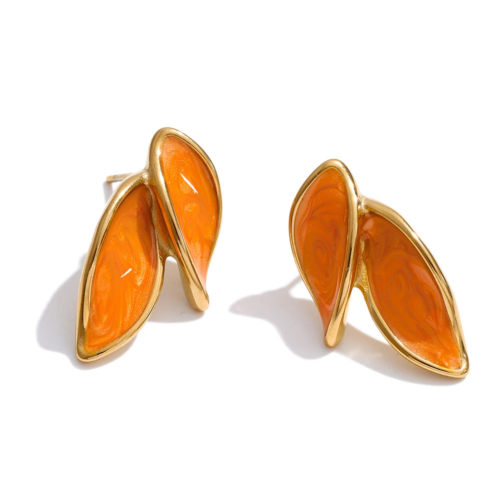 Front view of gold plated enamel leaf stud earrings