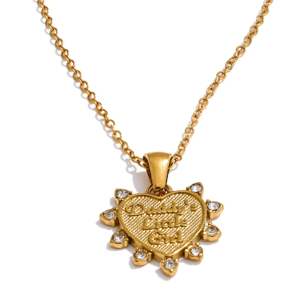 Jewelry set featuring gold necklace and earrings displayed together