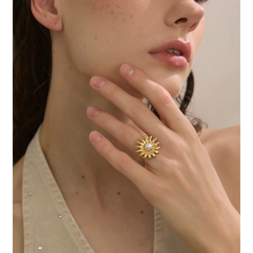 Sunflower pearl earrings with radiant golden surface