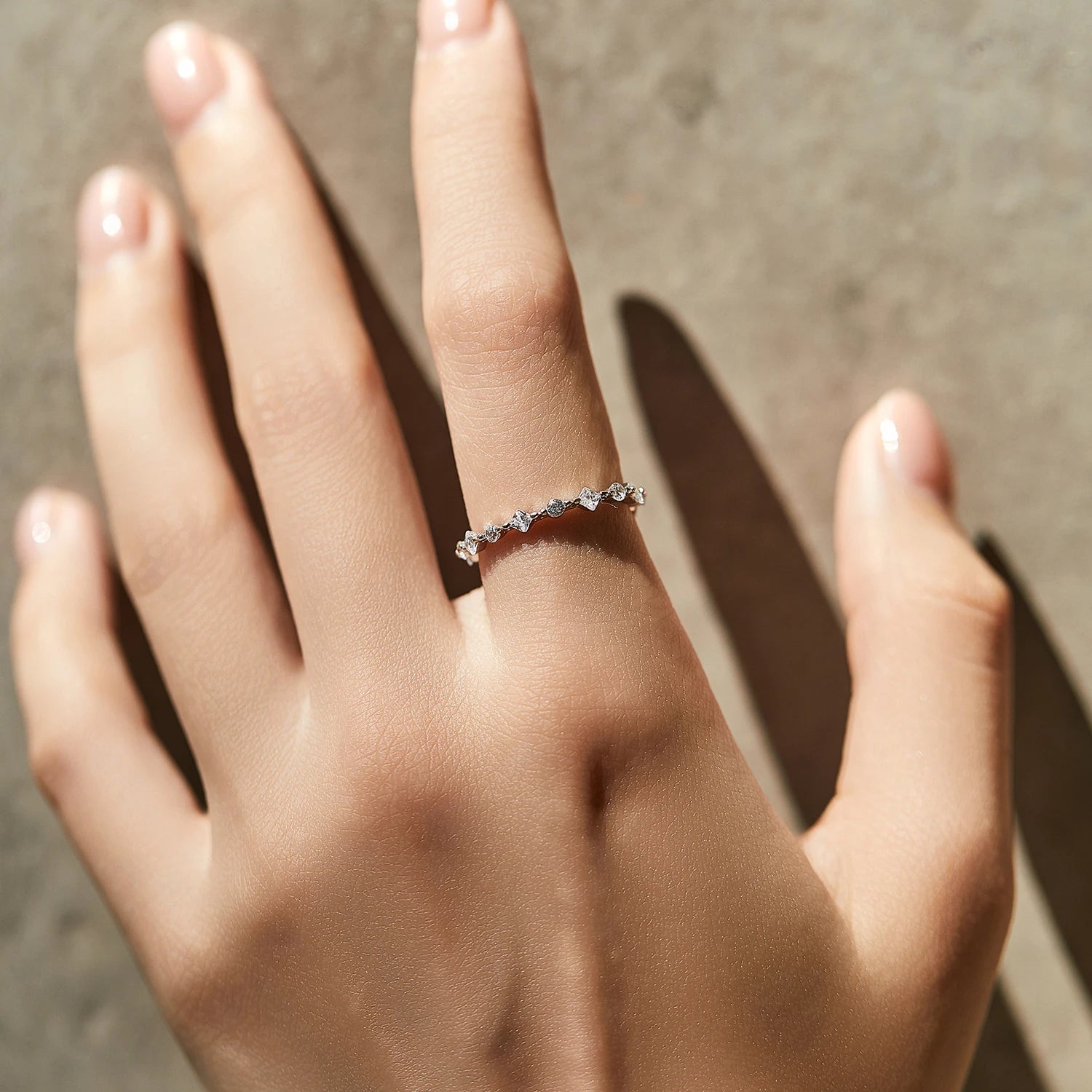 Sterling silver ring shown as a delicate stacking ring