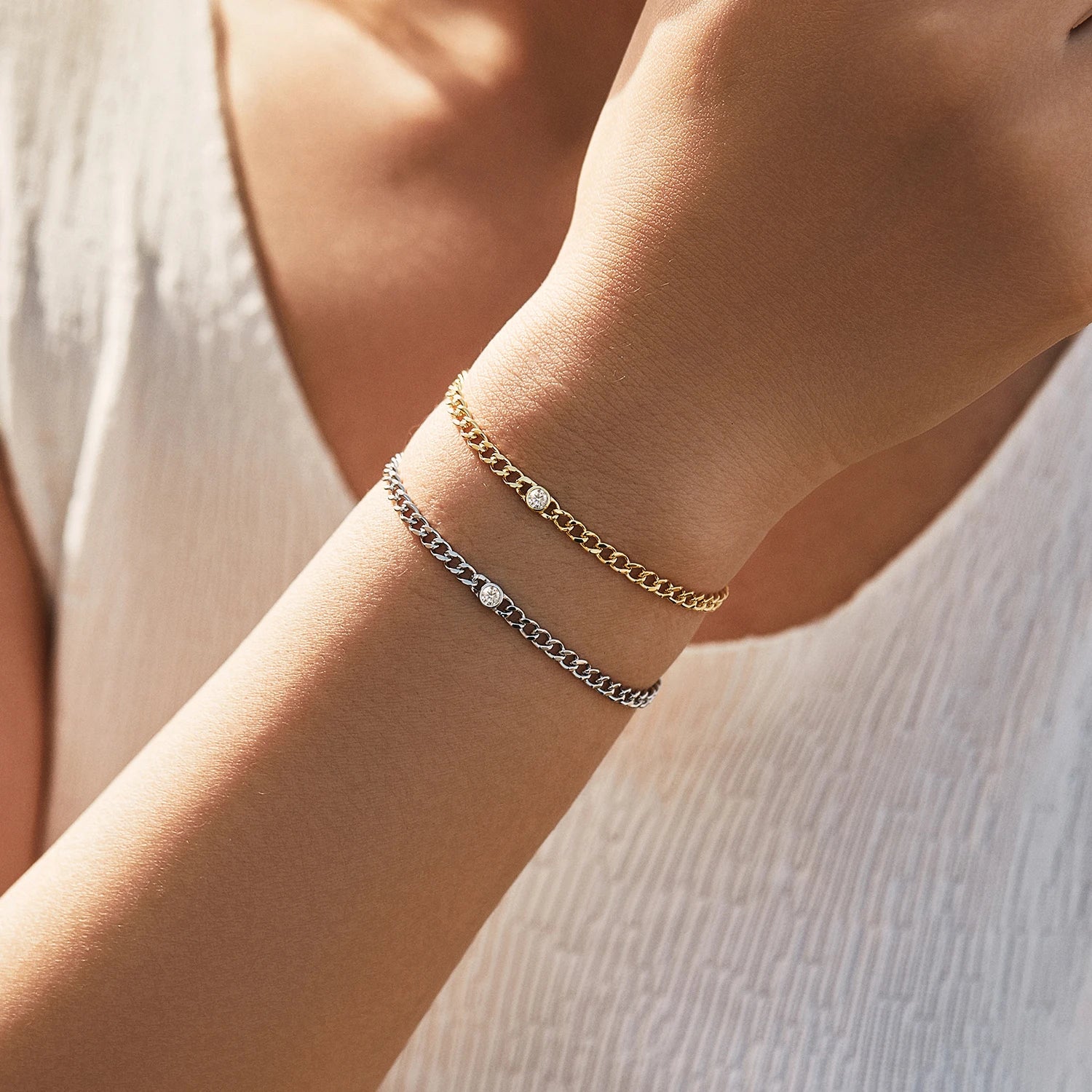 Close up of moissanite diamond set in sterling silver bracelets chain style