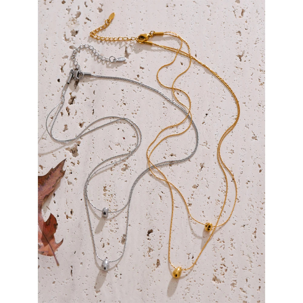 Close view of necklace pendant on a necklace showing polished details