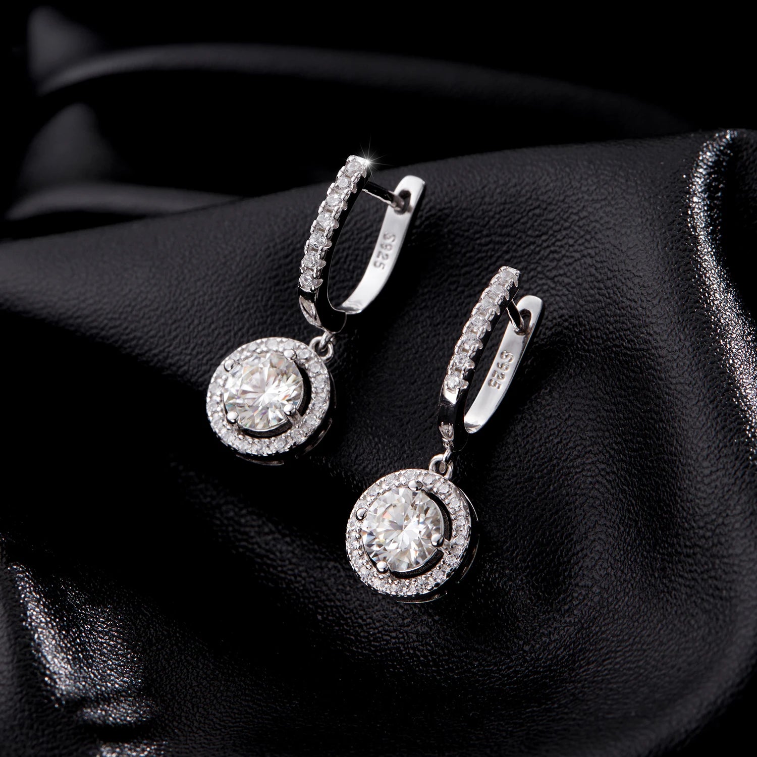Lifestyle shot of ear rings styled as refined drop earrings