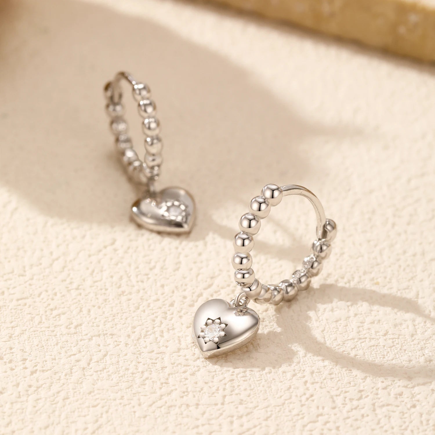 925 sterling silver heart earrings in classic hoop style