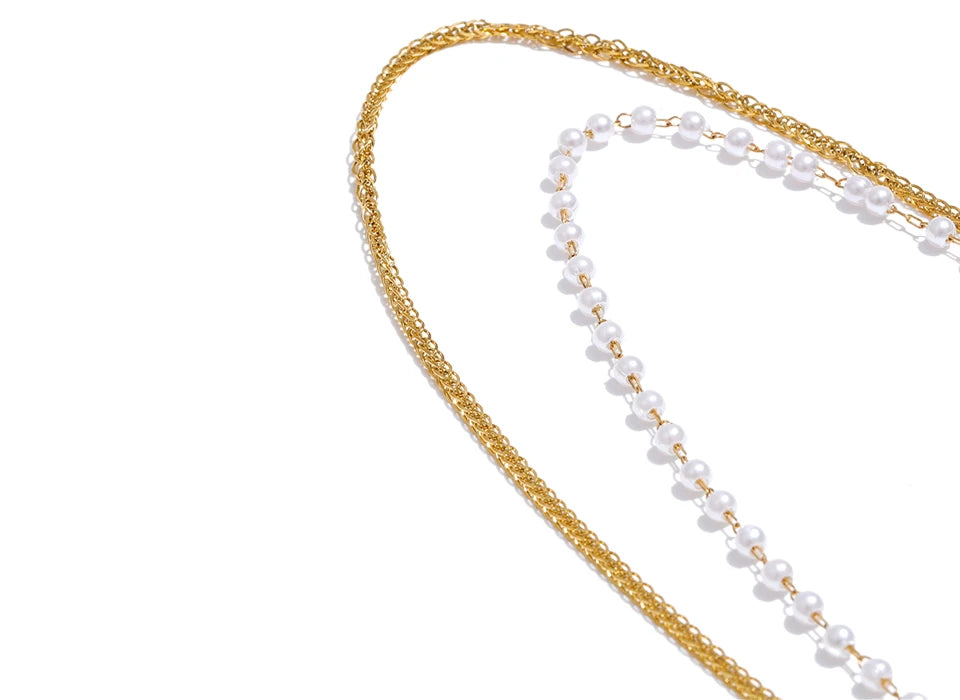 Pearl in necklace design with polished gold plated tone