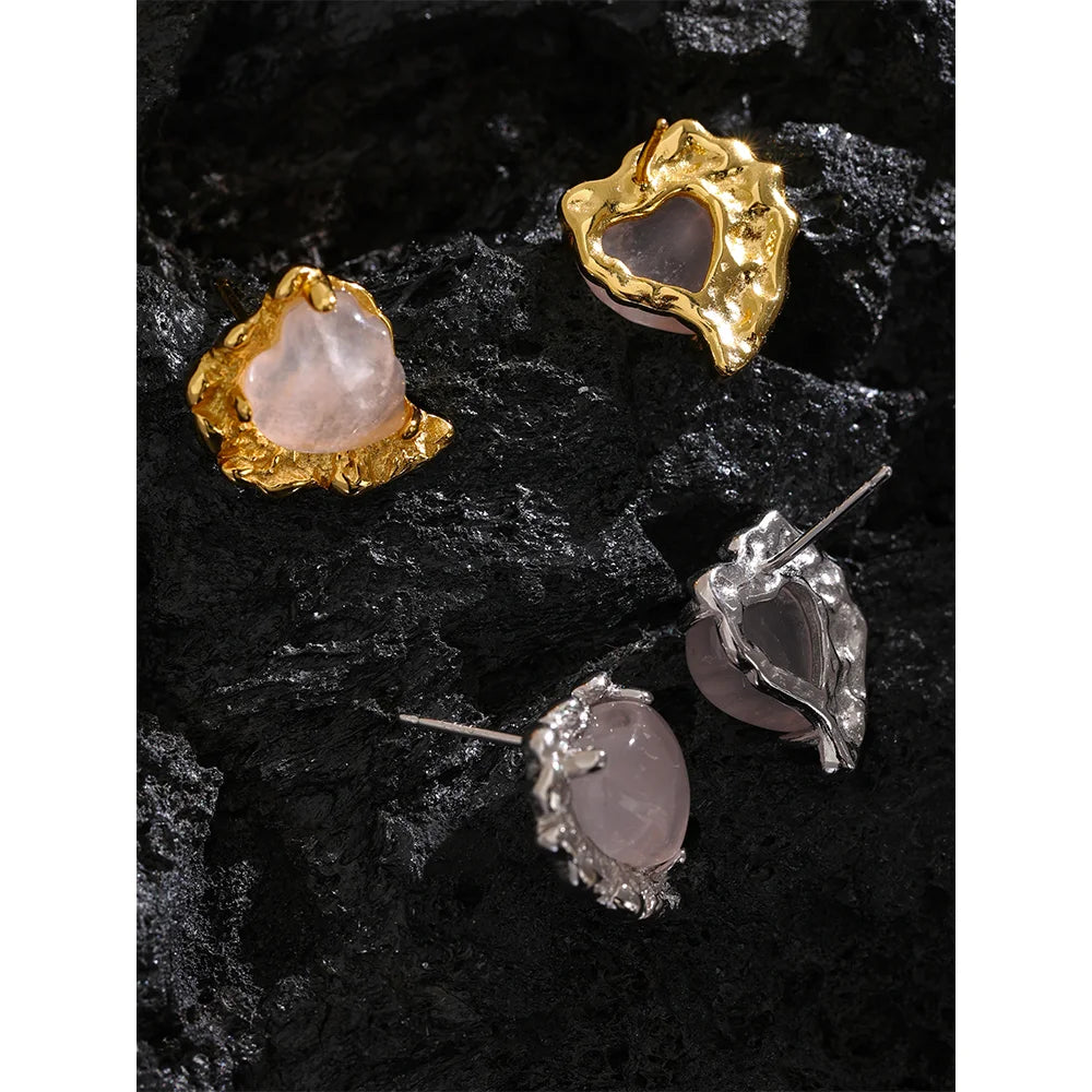 Heart earrings crafted as women stud earrings with sterling silver earrings