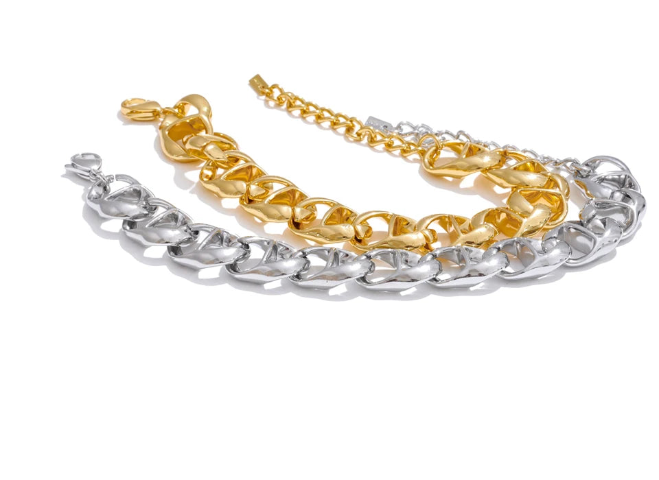 Fashion flat lay featuring bracelet bracelets and a gold plated chain