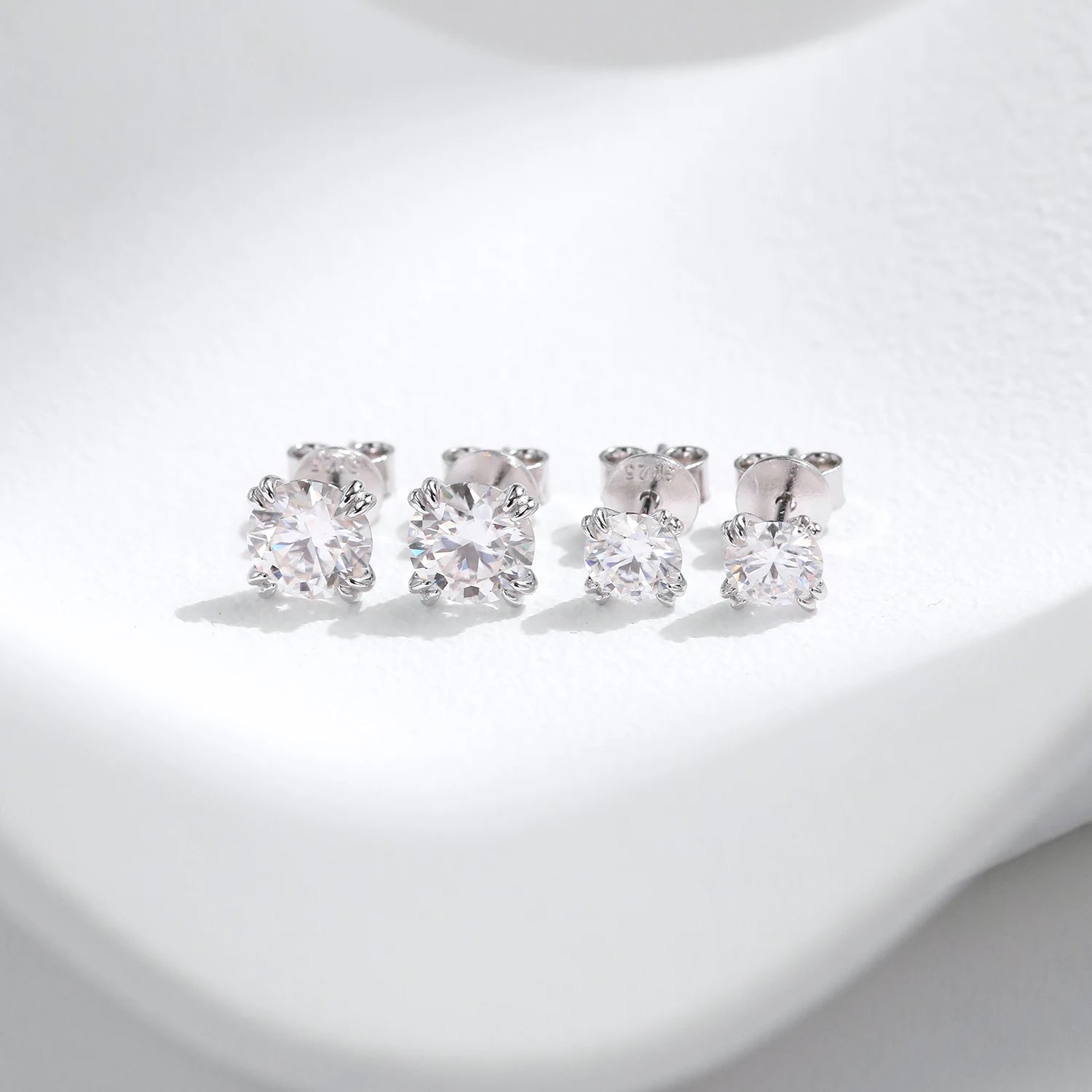 Elegant ear rings styled as silver earrings with moissanite jewelry glow