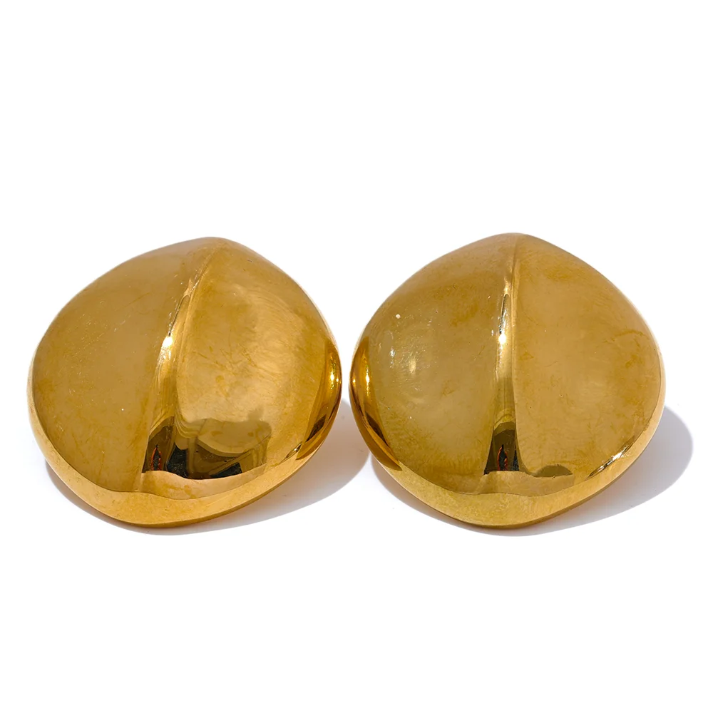 Gold plated ear rings in a geometric curve for gold jewelry styling