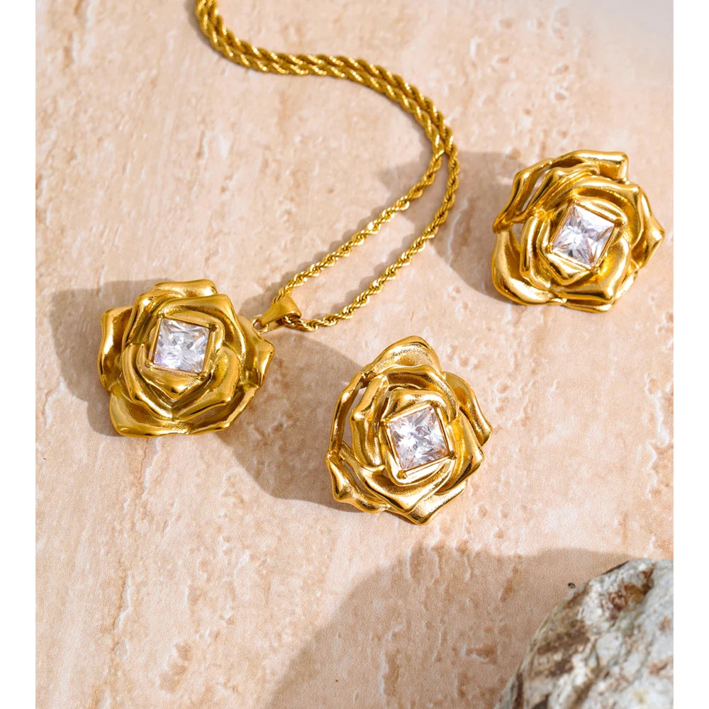 Close-up of gold i necklace crafted with sparkling zirconia stones