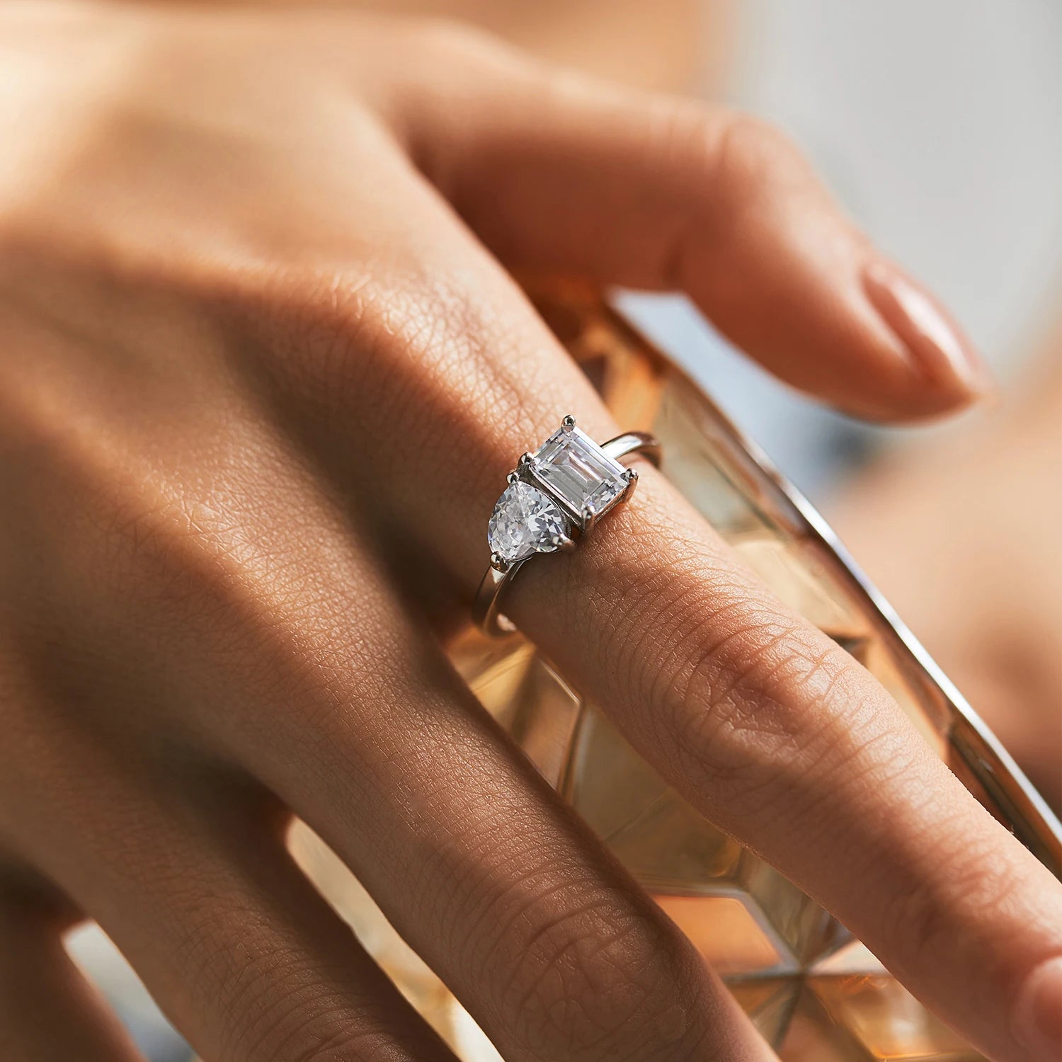 Delicate sterling silver ring featuring a bright heart cz center