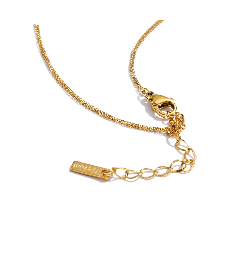 Gold in necklace design with enamel chili pendant