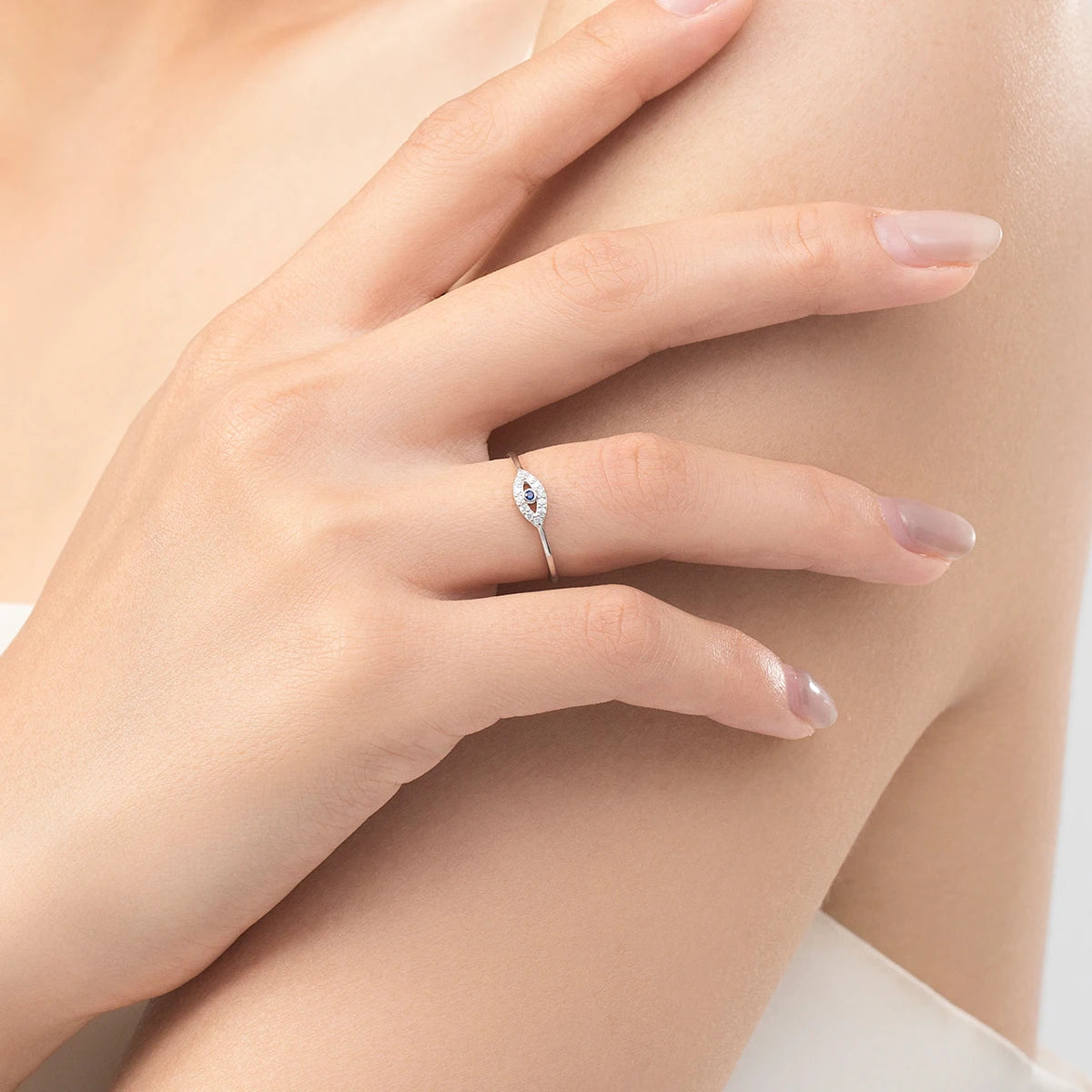 Close up of 925 sterling silver blue eye centerpiece on a silver necklace