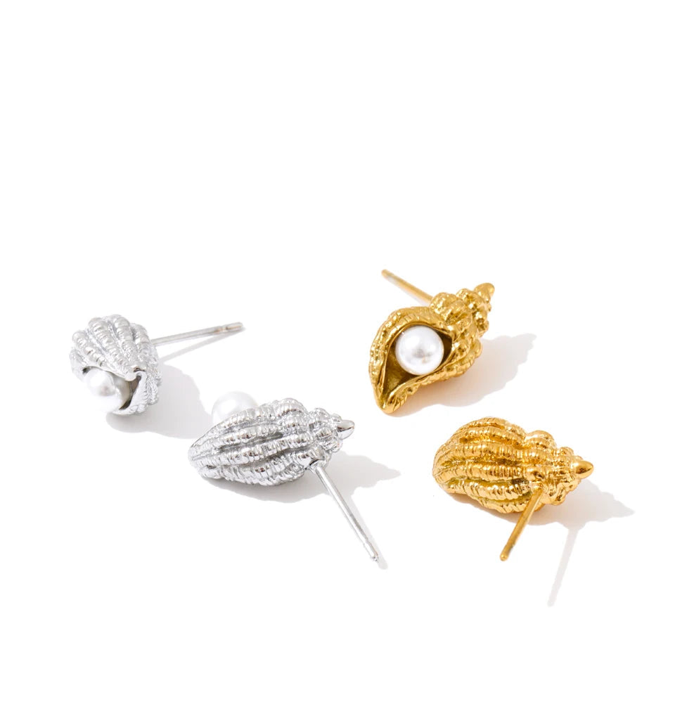 Women with earrings wearing chic conch inspired pearls