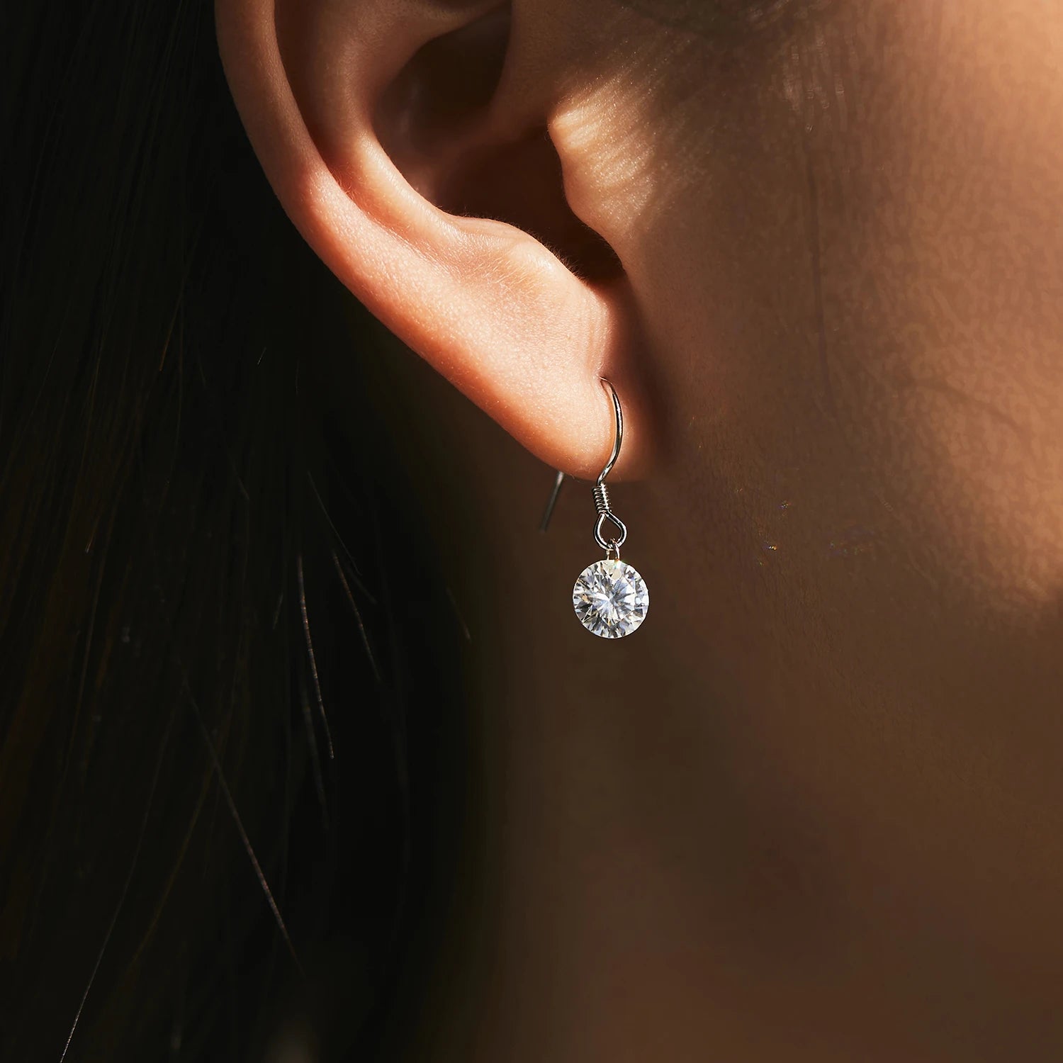 Side view of dangle earrings showing lightweight ear rings design