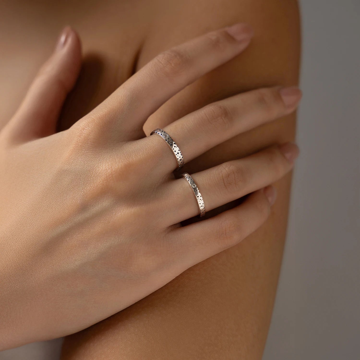 Couple ring in sterling silver featuring moissanite and charming stars