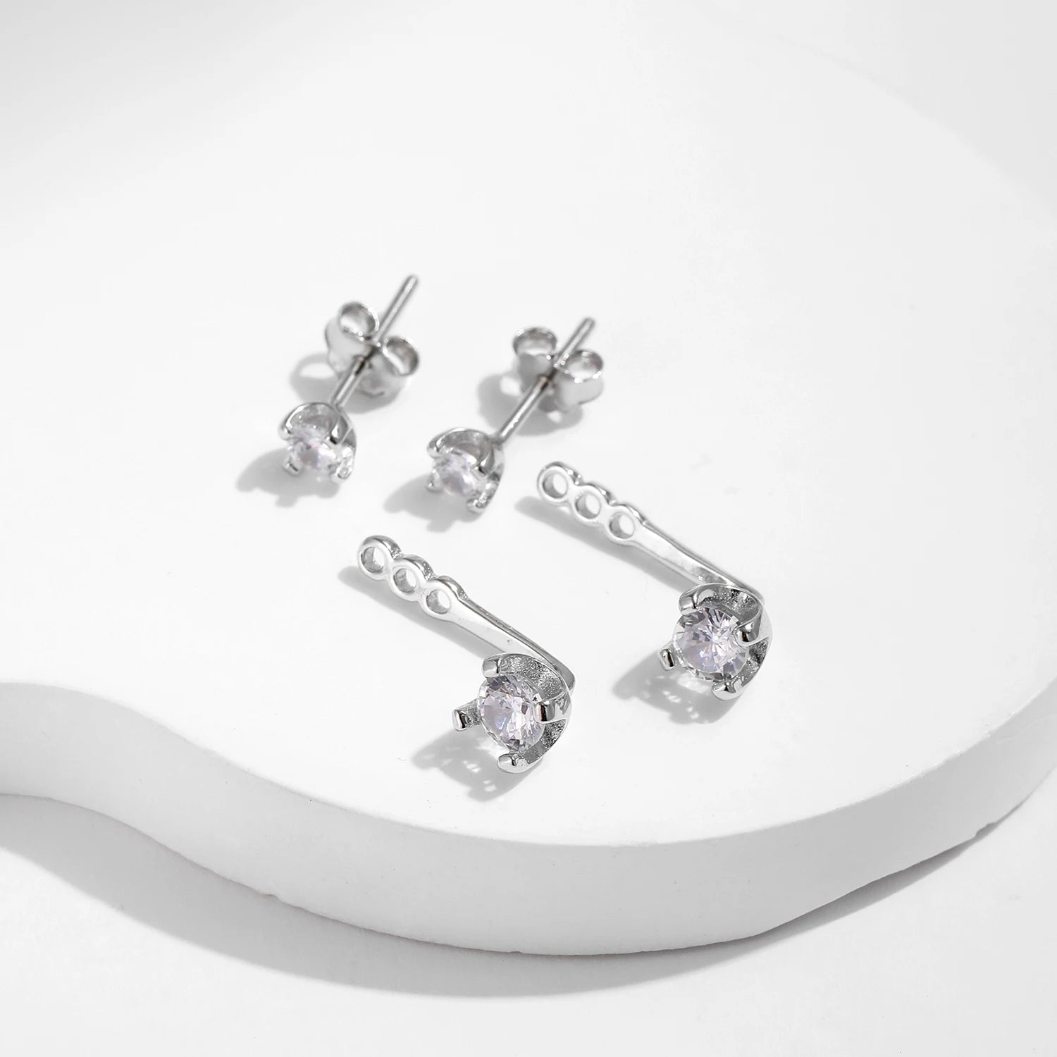 CZ ear stud paired with ear climbers for layered shine