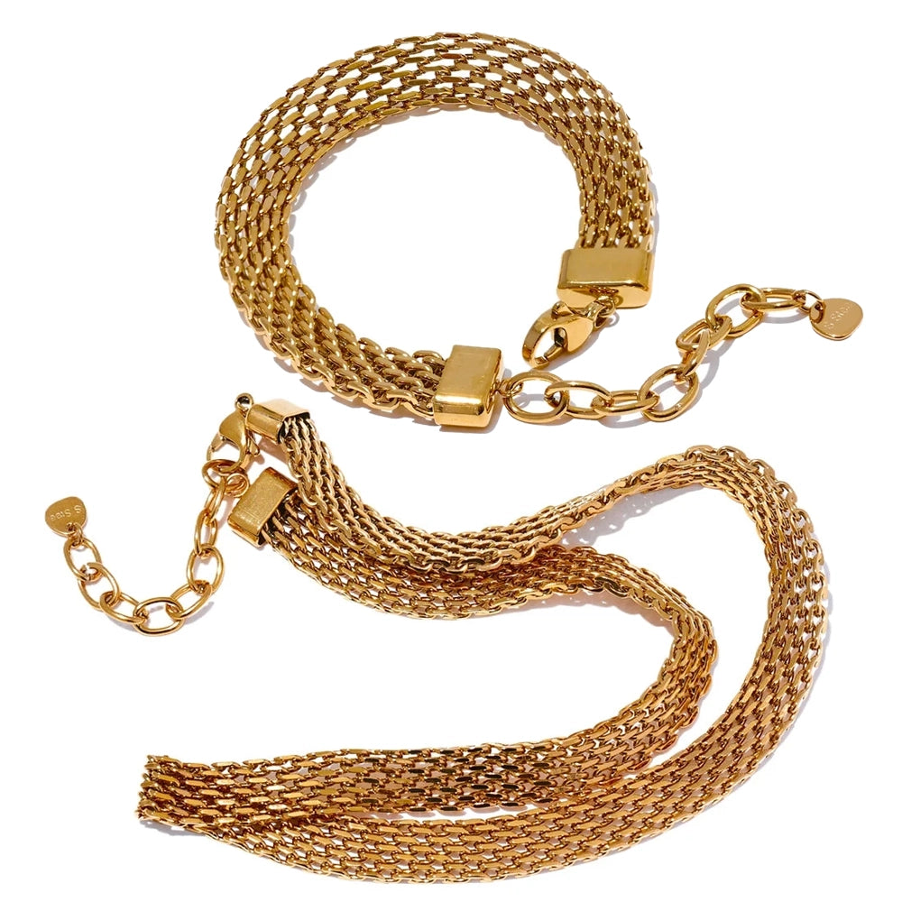 Cuban chain gold jewelry set with a gold chain and gold bracelet