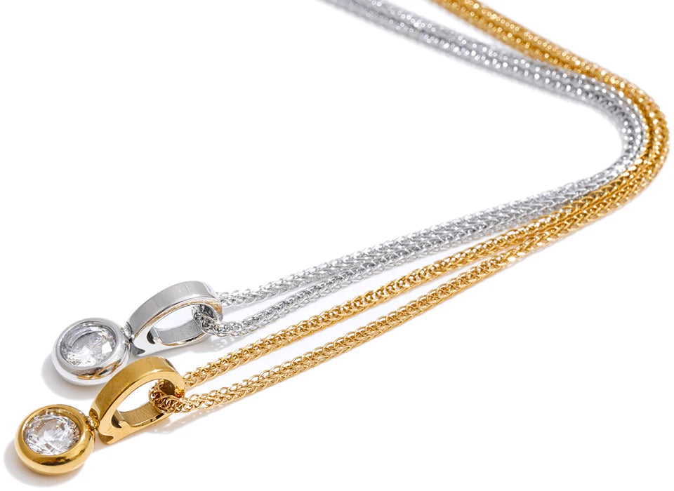 Women wearing gold plated cz necklace accessory