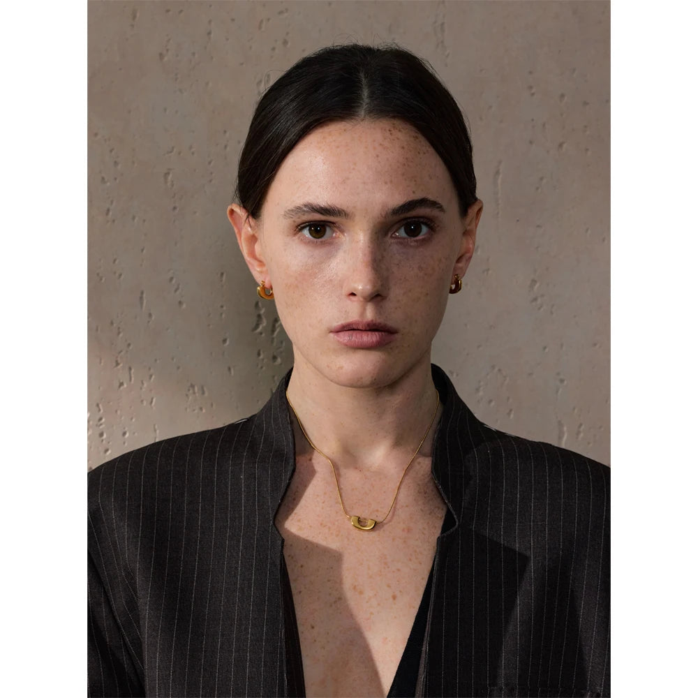 Necklace and earrings set in stainless steel jewelry with polished finish