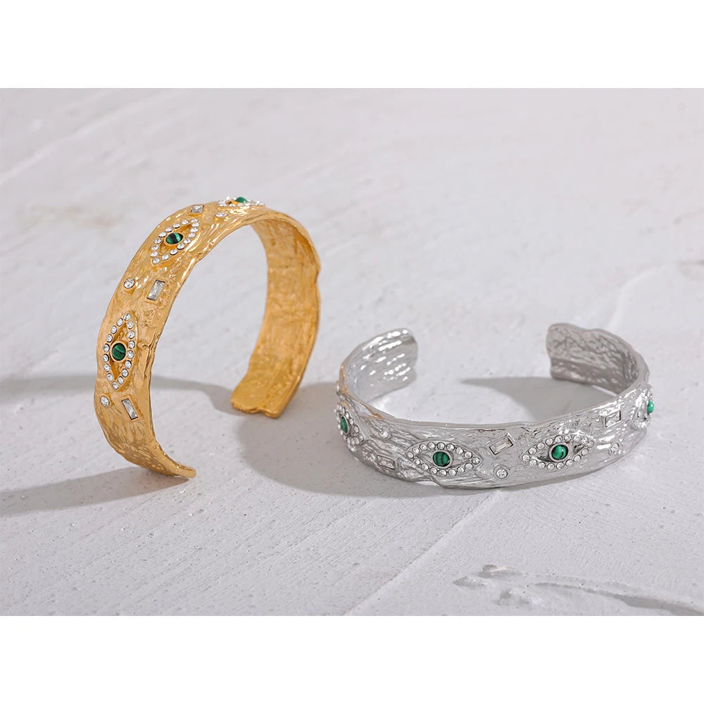 Eye motif cuff bracelet with zircon sparkle in steel