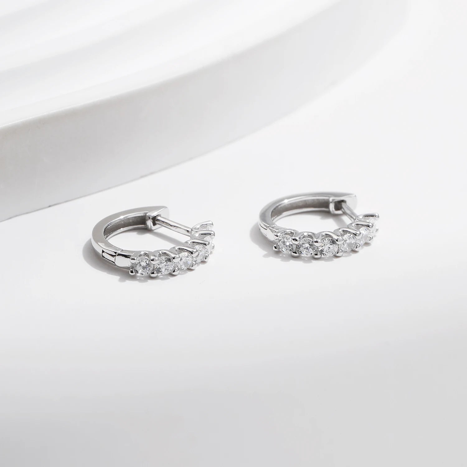 Sterling silver earrings pairing with moissanite jewelry rings