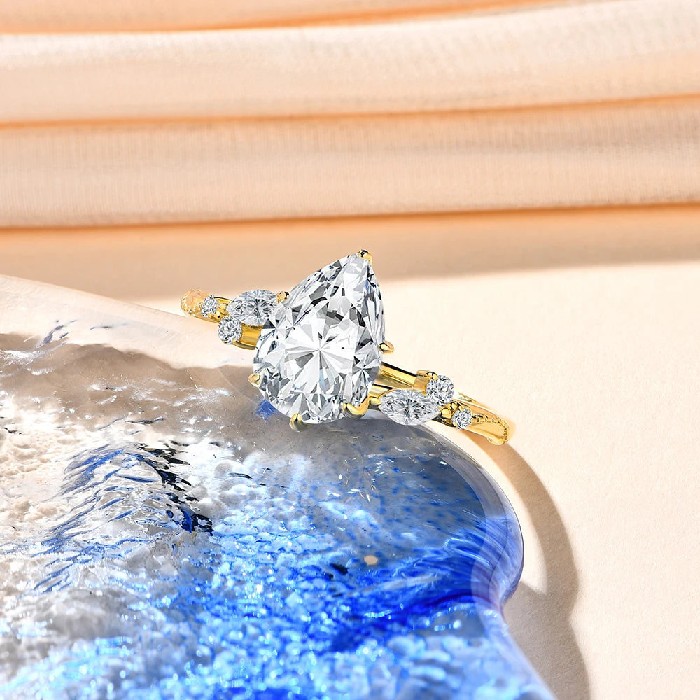 Silver ring for women featuring moissanite diamonds and gold in ring detail