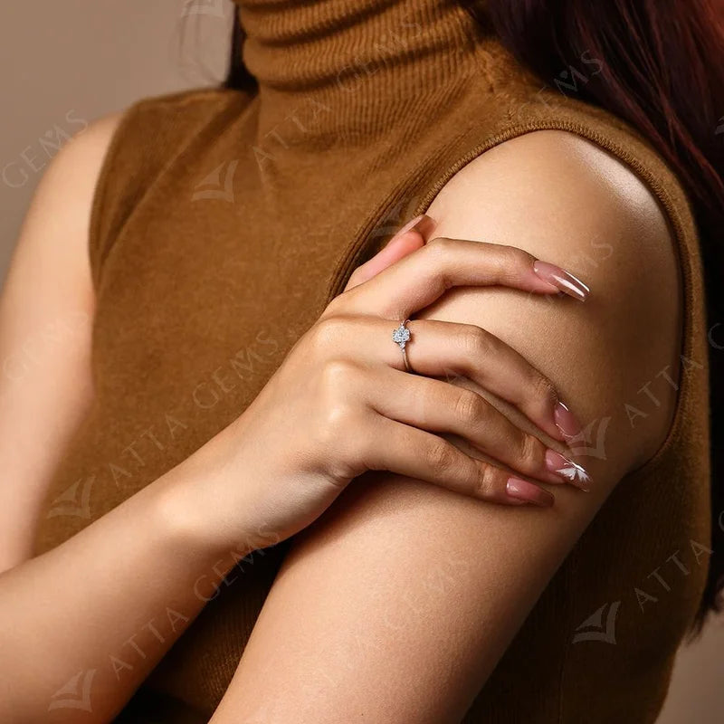 Close view of 0.6CT moissanite engagement ring and classic setting